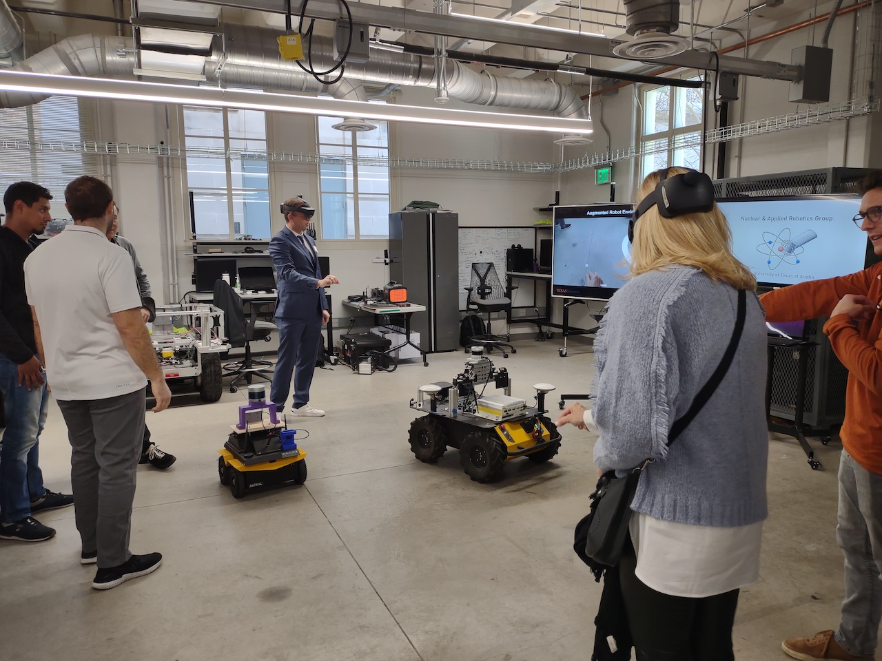 IBA members focus their efforts in UT’s research focus areas of Health and Well-Being, Energy and Environment, and Technology and Society. Here, members use VR to pilot cars with assistance from Texas Robotics students and faculty