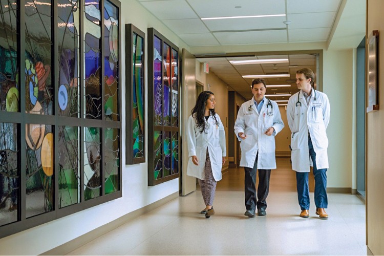 Dell Medical School residents in hallway