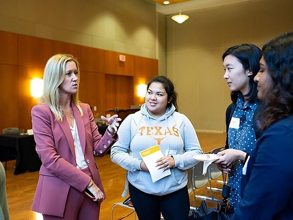 PAIB Member with students
